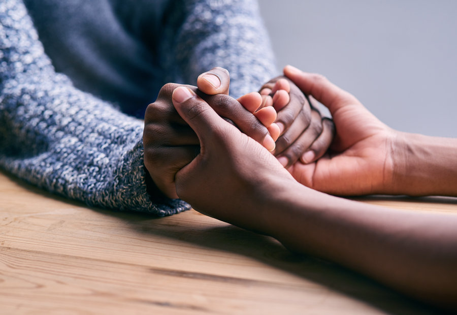 Hands joined together in unity