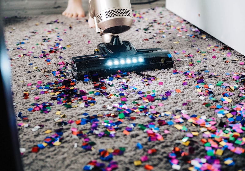 Professional carpet cleaning with industrial vacuum equipment